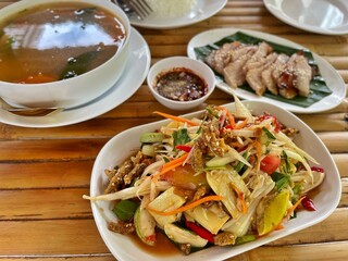 spicy papaya with black crab Thailand called farmer crab and fresh shrimp that is famous of Thailand