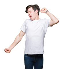 Young handsome man wearing casual white t-shirt over isolated background stretching back, tired and relaxed, sleepy and yawning for early morning