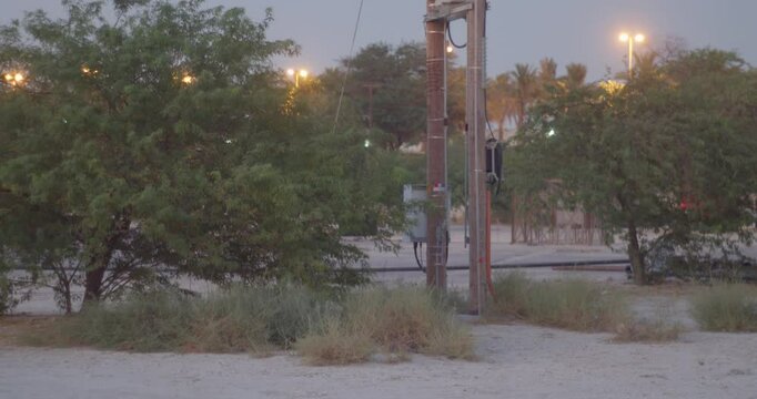 Electric pole in desert of Riffa