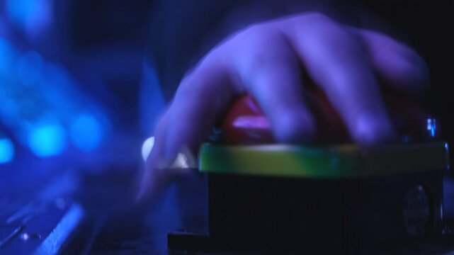 Child smashing an emergency button in dark control room 4k
