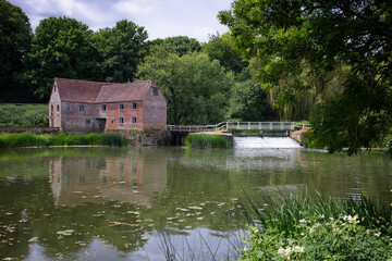 The Mill and Weir at Sturminster Newton on the river Stour in Dorset UK