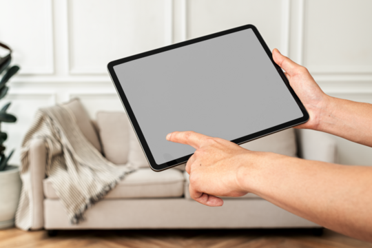 Tablet screen png mockup with sofa background