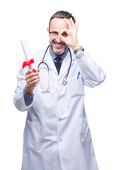 Middle age senior hoary doctor man holding degree certificate over isolated background with happy face smiling doing ok sign with hand on eye looking through fingers