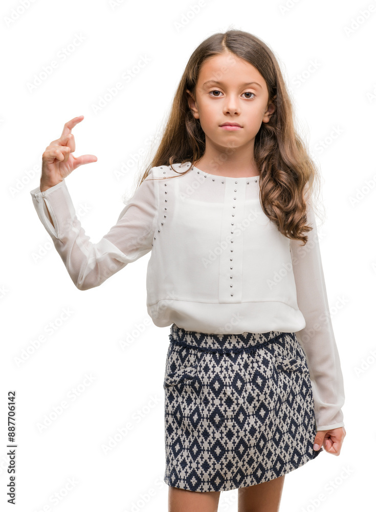 Wall mural brunette hispanic girl smiling and confident gesturing with hand doing size sign with fingers while 