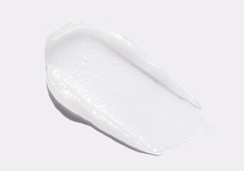 sample smear of cosmetic peeling gel on a light gray background close-up