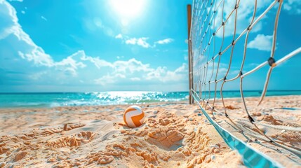 Beach background with beach volleyball net and a game in progress