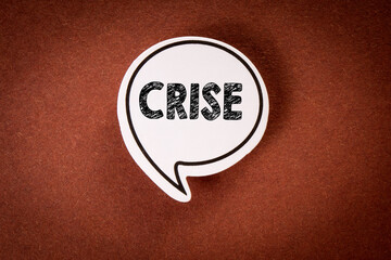 Crisis in Portuguese. Speech bubble with text on brown background