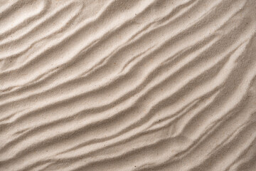 Sand waves texture background. Sand on beach as background. top view