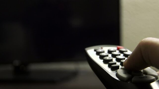 Flipping through tv stations with hotel remote 4k

