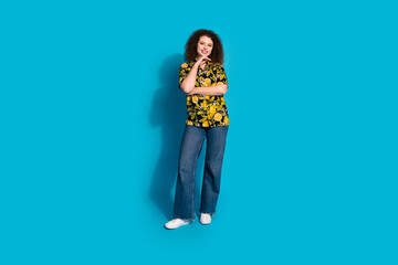 Full length photo of thoughtful positive woman wear print shirt arm chin empty space isolated blue color background