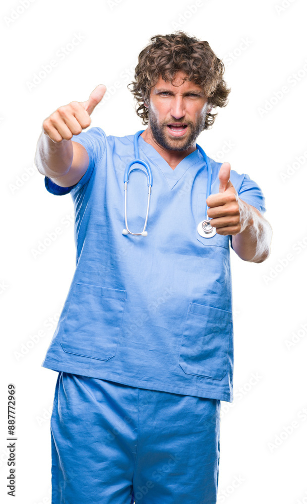 Poster handsome hispanic surgeon doctor man over isolated background approving doing positive gesture with 