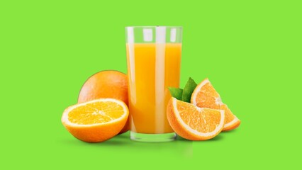 glass of orange juice and oranges