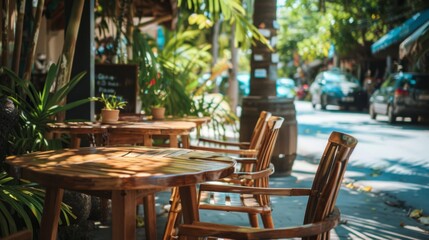 Fototapeta premium A table with two chairs and a potted plant in front of it