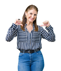 Middle age mature business woman over isolated background looking confident with smile on face, pointing oneself with fingers proud and happy.