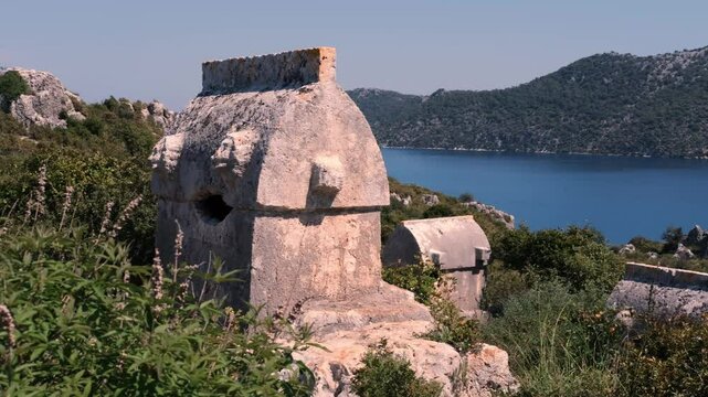 view of lycian sarcophages stone tomb of ancient civilization city of tlos in kekova region antalya turkey