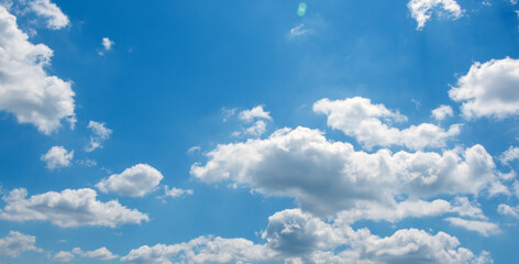 Blue sky with white clouds.
