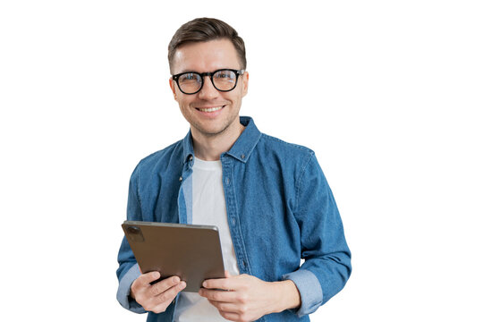 A positive male manager utilizes a tablet and laptop computer. cut out
