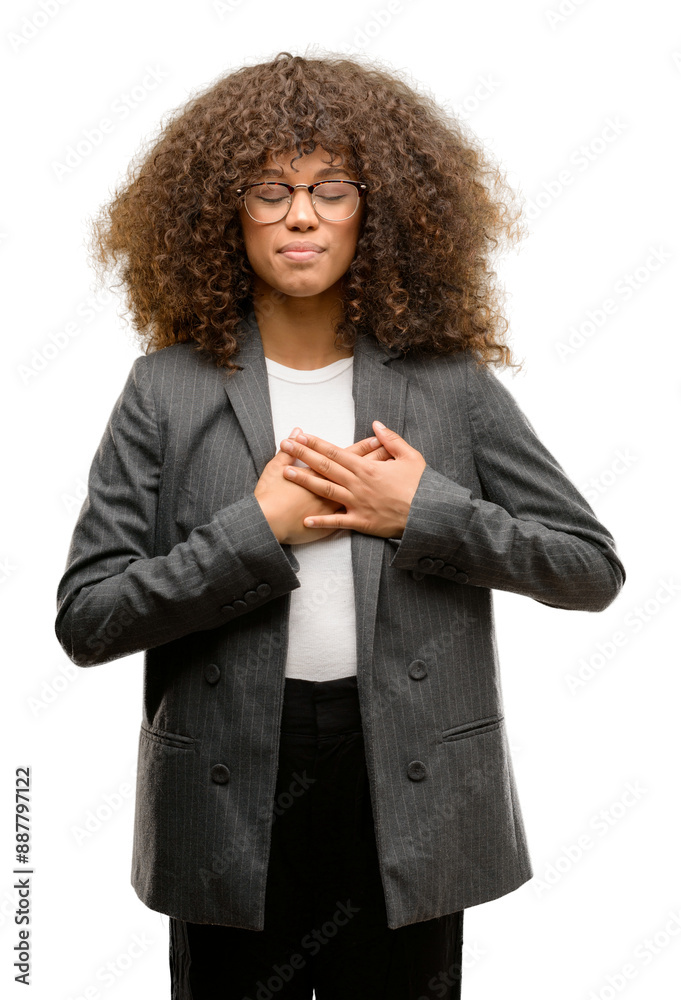 Canvas Prints African american business woman wearing glasses smiling with hands on chest with closed eyes and grateful gesture on face. Health concept.