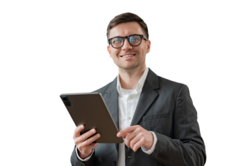 A male businessman manager uses a tablet computer in the office. Cut out