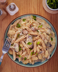 Sardine pasta dish in a creamy sauce.