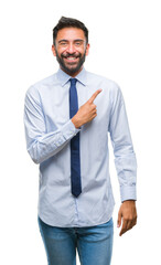 Adult hispanic business man over isolated background cheerful with a smile of face pointing with hand and finger up to the side with happy and natural expression on face looking at the camera.