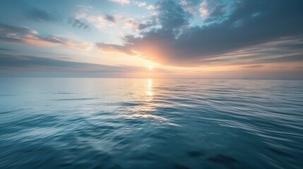 Fototapeta premium Calm ocean under sunrise clouds