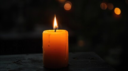 Candle lighting up darkness