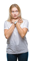 Fototapeta premium Young caucasian woman over isolated background shouting and suffocate because painful strangle. Health problem. Asphyxiate and suicide concept.