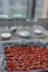 Roasted Tomatoes in Olive Oil,dry small tomatoes,cooking process,canned food,healthy home cooking,italian,spice,small tomato in an oven,colorful food,zen eating,diet