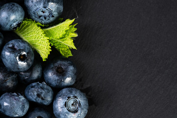 Fresh blueberries, antioxidant superfood with mint