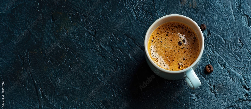 Poster Homemade coffee cup with coffee on a dark background creating a cozy atmosphere Ideal for use in designs needing a copy space image