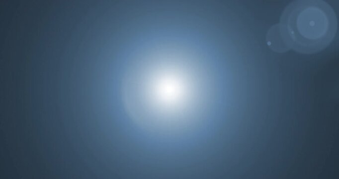 abstract blue color bright lens flare pulse flashes leak for transitions on black background