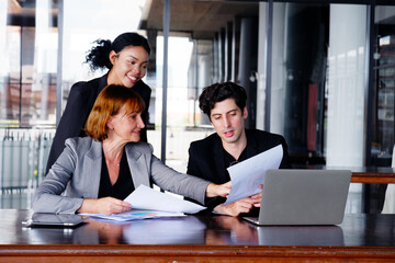 Businessmen and employees sit and work at tables. and business planning meeting.