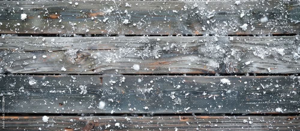 Poster snow dusted on a wooden background providing copy space image