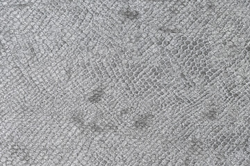 Abstract textured gray background.