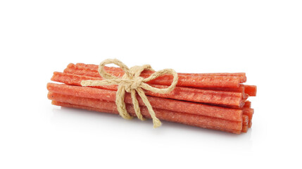 Dried cured sausages, thin salami sticks, cabanossi or kabanos isolated on white background  