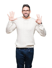 Young handsome man wearing glasses over isolated background showing and pointing up with fingers number eight while smiling confident and happy.
