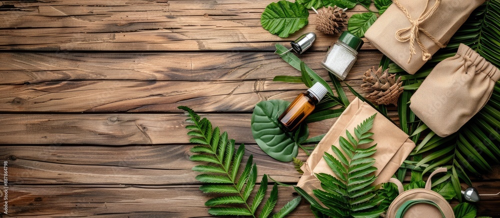 Poster top view of eco friendly accessories on a wooden surface with ample copy space image