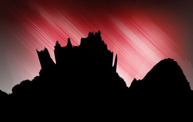 pinky red dawn sky over the mountains in silhouette