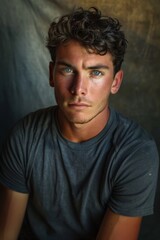 Obraz premium hyper realistic photograph of a handsome american man in a t-shirt looking directly at the camera