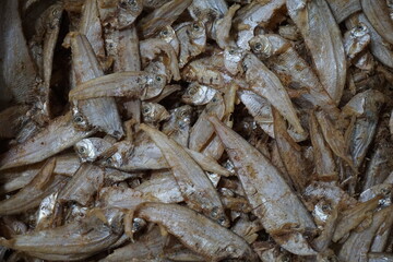 Closeup shot of dried sole fish in a seafood shop, Salted dried fish being sold at an Asian fish market, Freshly caught dried sea fish at a local market