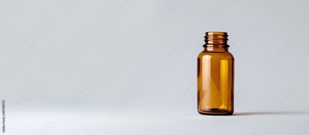 Poster amber bottle capsule on a white background provides ample copy space for text