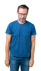Fototapeta premium Handsome middle age hoary senior man wearin glasses over isolated background depressed and worry for distress, crying angry and afraid. Sad expression.