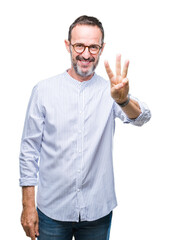 Fototapeta premium Middle age hoary senior man wearing glasses over isolated background showing and pointing up with fingers number three while smiling confident and happy.