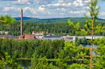 A factory in middle of green forest. Green clean development and future planning. 