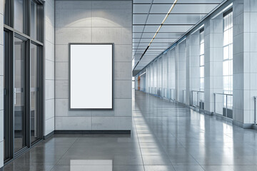 blank poster frame mockup in a modern university campus hallway, perfect for showcasing institutional announcements and student events. Photo