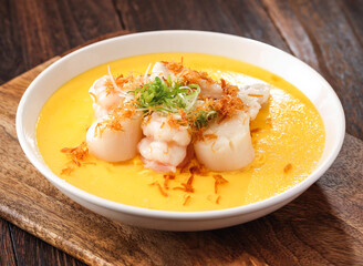 Steamed Egg with Seafood soup with shrimp paste served in dish isolated on background side view of hong kong food