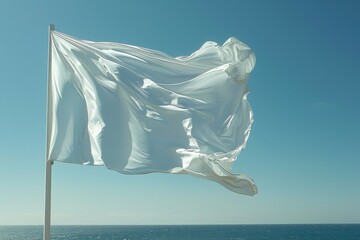 Blank flag waving on a pole with a clear sky background