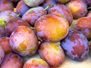 Plums fresh fruits sour sweet taste