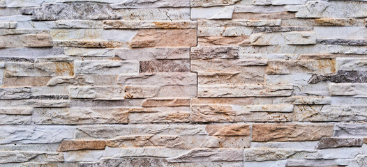 Old stone wall. Granite background. Granite floor